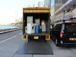 4 astuces pour un déménagement réussi dans le secteur immobilier white front-load washer in yellow delivery truck